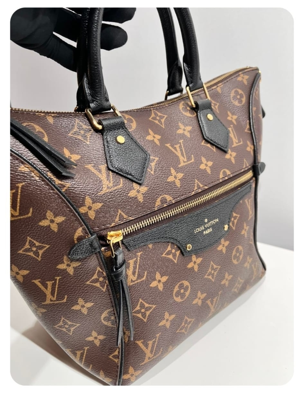 Louis Vuitton Brown Monogram Canvas Satchel with Black Trim.